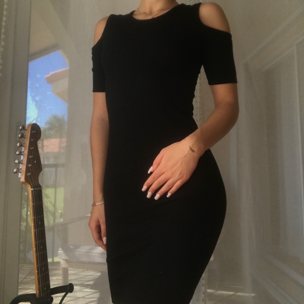 Black bodycon dress with shoulder cutouts